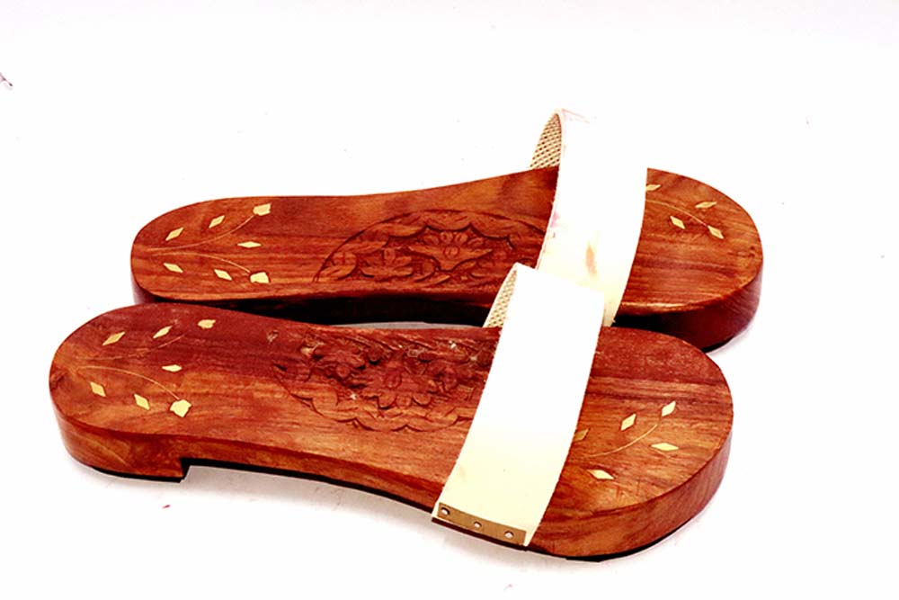 Premium Photo | Small size wooden slippers for god-thanhphatduhoc.com.vn